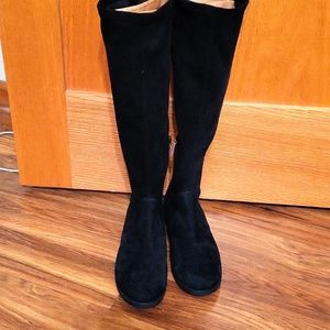Knee high boots. Size 8. New without tag
